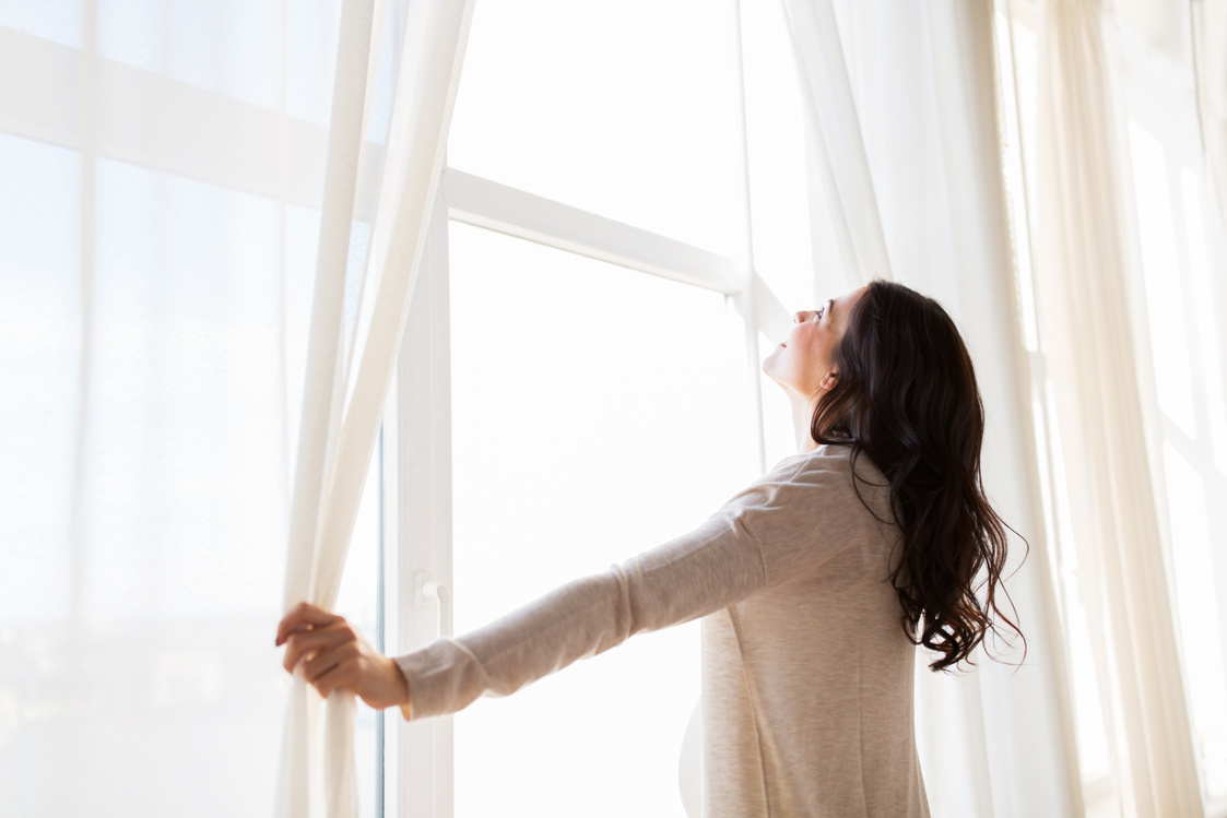  Woman Opening Window 